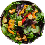 mesclun mix spring salad with poppy seed salad dressing with croutons and bell peppers on transparent background shot from overhead view