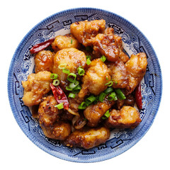Wall Mural - chinese general tso's chicken stir fry in plate on transparent background shot from overhead view 