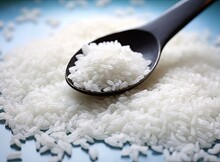 Dry White Rice и Spoon Created With Generative AI Technology