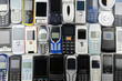 A Heap of old used mobile phones with keyboards. Saved Personal data in a lot of Communication devices concept