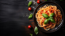 Italian Spaghetti With Basil Garnish And Herbs On Black Wooden Board Background, Plate Of Delicious Italian Pasta On Dark Wood Table Counter, Text Copy Space, Top  Down View, Flat Lay, Generative Ai