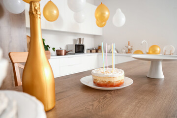 Sticker - Birthday cake on table in kitchen, closeup