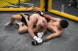 © FotoArtist - Two professional boxers fighting at the gym