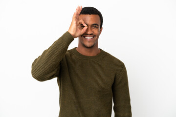 Wall Mural - African American handsome man on isolated white background showing ok sign with fingers