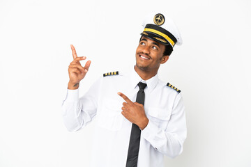 Wall Mural - African American Airplane pilot over isolated white background pointing with the index finger a great idea