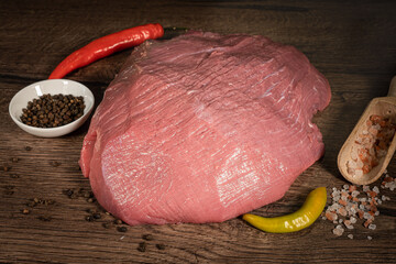 Wall Mural - big pork raw meat piece ready for cooking. a piece of pork