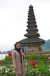 © BAGUS SATRIYA - asian hijab woman vacation in Pura Ulun Danu Beratan Bedugul Bali