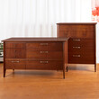 Mid-century modern matching dresser pair. Low and tall pieces. Vintage walnut furniture. 
