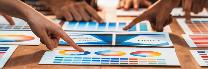 Aufkleber - Graphic designer brainstorm logo and graphic art at busy creative studio workshop. Experiment and brainstorm color palette and pattern at workspace table for creative design. Panorama shot. Scrutinize