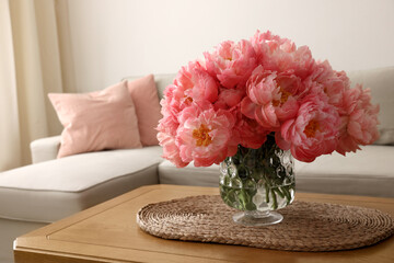 Canvas Print - Beautiful pink peonies in vase on table at home, space for text. Interior design