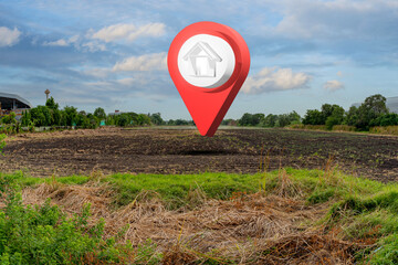 House symbol with location pin icon on empty dry cracked swamp reclamation soil in real estate sale or property investment concept, Buying new home for family