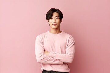 Wall Mural - Handsome young asian man with clean fresh skin on pink background.Generative Ai