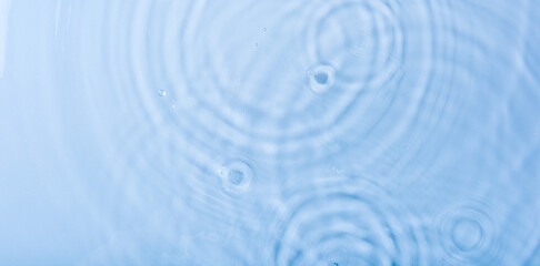 Wall Mural - transparent blue clear water or water ripples texture background