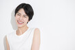 © kapinon - 夏のイメージに使いやすい日焼けや紫外線のアジア系女性の顔のアップの美容イメージ　明るいコピースペース