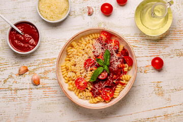 Wall Mural - Homemade pasta with tomato sauce, top view.