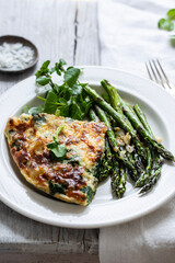 Wall Mural - Spinach and potato fritatta with roasted asparagus