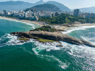 Wall Mural - Aerial view of Rio de Janeiro, Ipanema beach and Pedra do Arpoador. Skyscrapers beaches and nature, surfers in the water. 06-07-2023. Brazil

