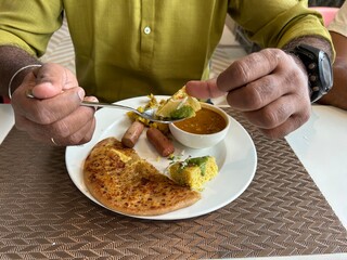 Wall Mural - person holding a plate of food