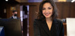 © Minerva Studio - Smiling businesswoman in her office