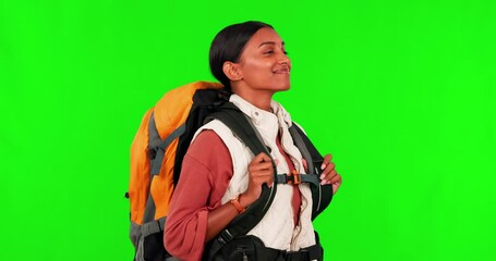 Wall Mural - Hiking, breathing and turn with a woman on green screen background in studio to explore for adventure. Smile, freedom or fresh air with a young female hiker looking happy on a trip against chromakey