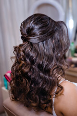 Wall Mural - Hairstyle for a bride with a silver accessory in her hair