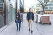 © Mariano - Two latin businessmen walking down the street