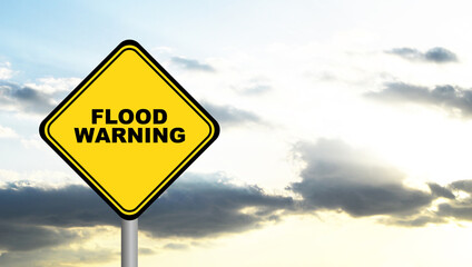 Sticker - flood warning sign on cloudy sky background	