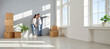 © Studio Romantic - Happy family couple moving to a new house or apartment. Joyful young man and woman homeowners standing in empty living room interior at home and looking through window at view. Banner background