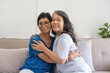 © Natee Meepian - One of lifes greatest pleasures, a good old friend. Shot of two happy elderly women embracing each other at home