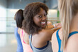 Portrait smiling woman enjoying exercise class in gym studio