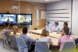 Fototapeta Miasto - Business people in video conference meeting