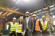 © KOTO - Portrait confident manager and steel worker team in factory