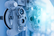 © eakgrungenerd - Phoropter eyesight measurement testing machine, Eye health check and ophthalmology concept. Web banner size. Copy space.