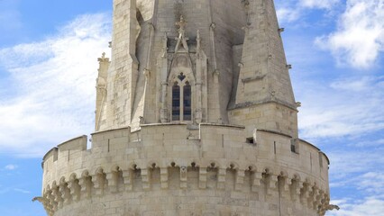 Wall Mural - Tour de la Lanterne tower on a sunny day in La Rochelle, France