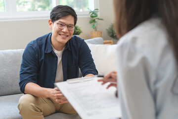 Man talking with mentor psychologist in therapy mental health anxiety session.