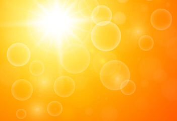 Orange hot sunny background, sun with bokeh, blazing hot sun on a hot summer day.