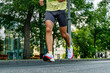 © Real Sports Photos - legs male runner athlete running marathon race, sports summer games