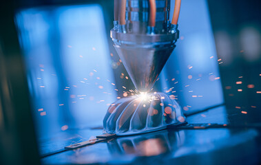 a modern 3d printer is printing a metal turbine. the future of machine part manufacturing.