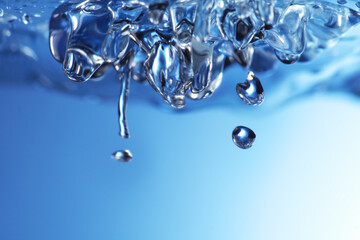 Wall Mural - abstract drop water splash on blue background