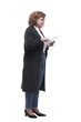 © ASDF - in full growth. mature woman with a digital tablet.