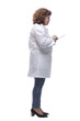 © ASDF - side view. female doctor using a digital tablet