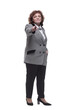 © ASDF - in full growth. Mature woman in a fashionable checked jacket.