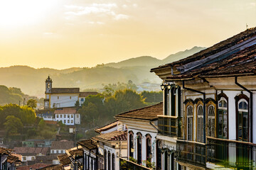 Wall Mural - Famous historical city of Ouro Preto in Minas Gerais with its old buildings in baroque, colonial style during sunset