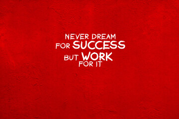 Wall Mural - Red concrete wall with inspirational quotes - Never dream for success but work for it