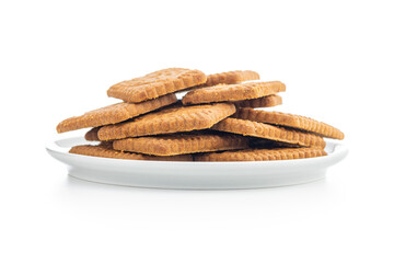 Wall Mural - Sweet caramel biscuits. Tasty cookies on plate isolated on white background.