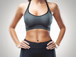 © Tatiana - Chest and upper body of a beautiful athletic young woman, close-up. Generative AI