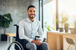 © Djomas - happy positive working people in a wheelchair ai generated