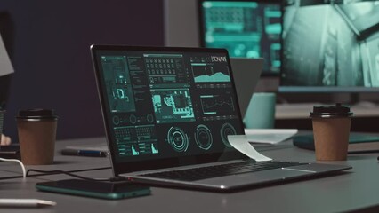 No people shot of laptop computer with data protection system on screen in cyber security agency late at night