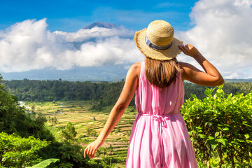 Canvas Print - Woman at volcano Agung on Bali,