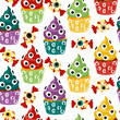 Seamless pattern of eye-catching Halloween cupcakes on a white background. Happy Halloween, scary sweets. Cartoon pattern with colored monsters with eyes and candy in the form of human eyes